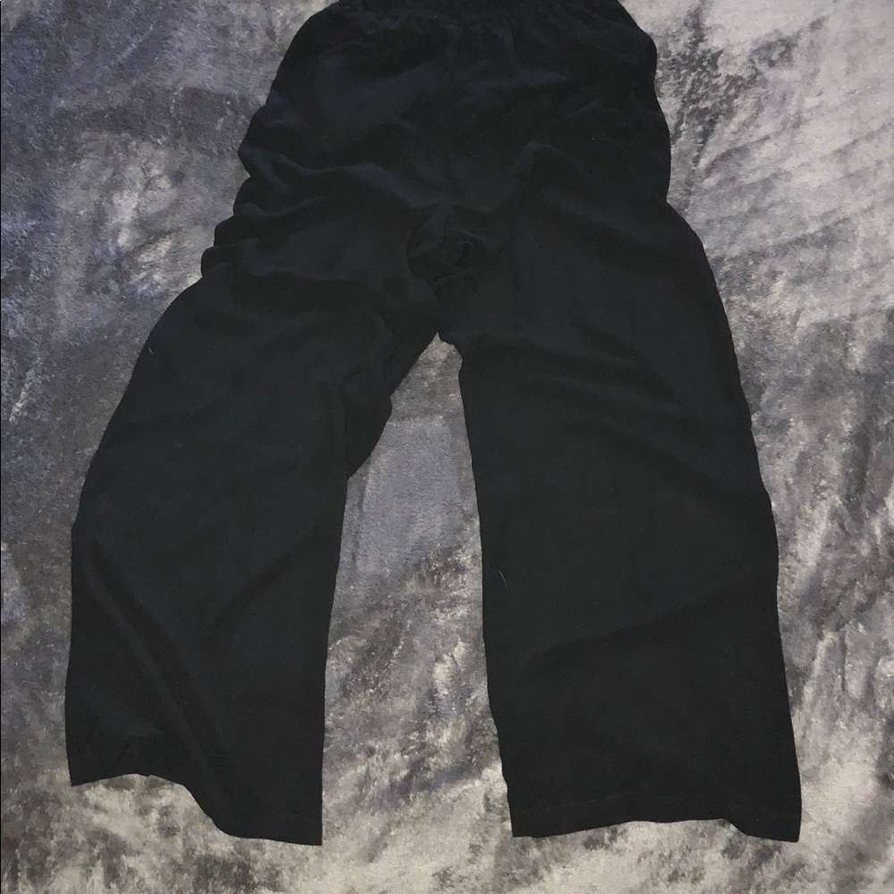 Black jumper size Large. Legs sheer with shorts.